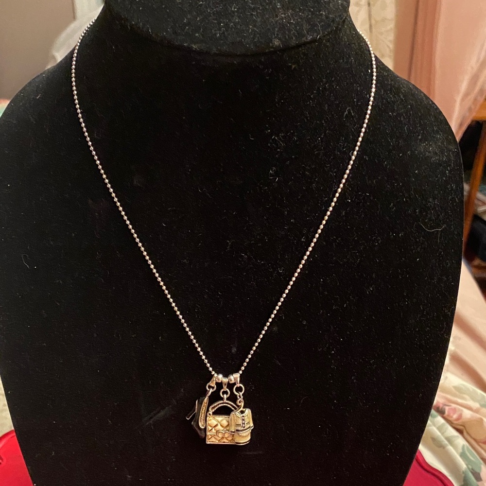 Silver Coloured Necklace with Three Charms
